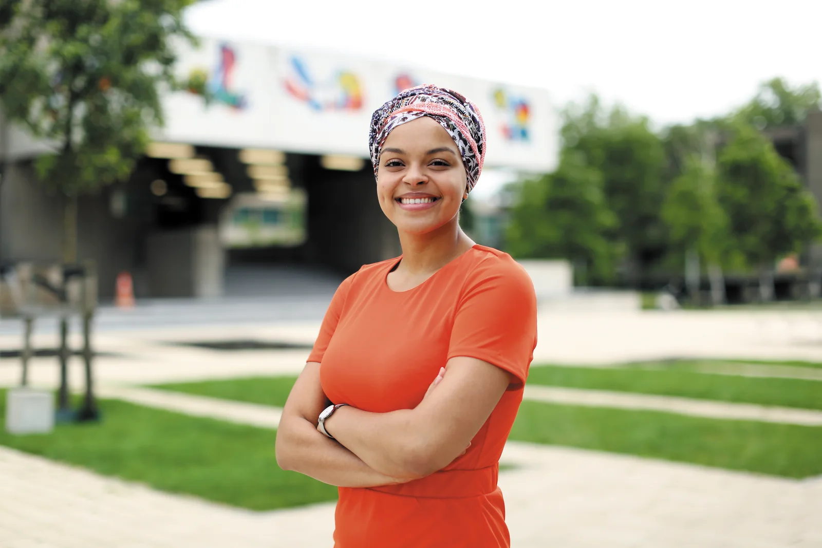Smiling student standing on the Erasmus University campus